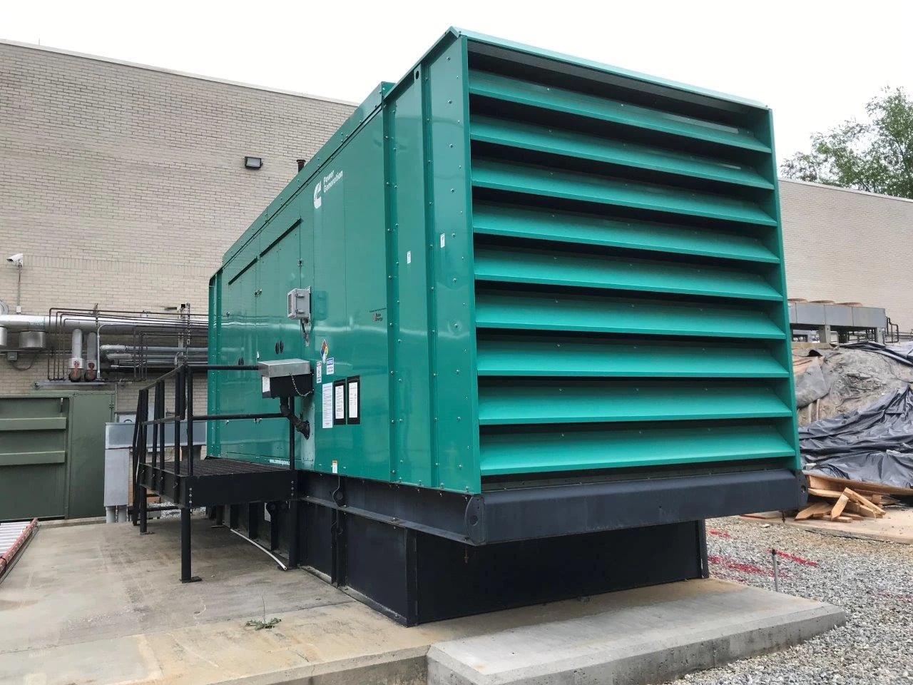 A diesel generator combines a diesel engine and an alternator to supply electrical power to mining equipment.
