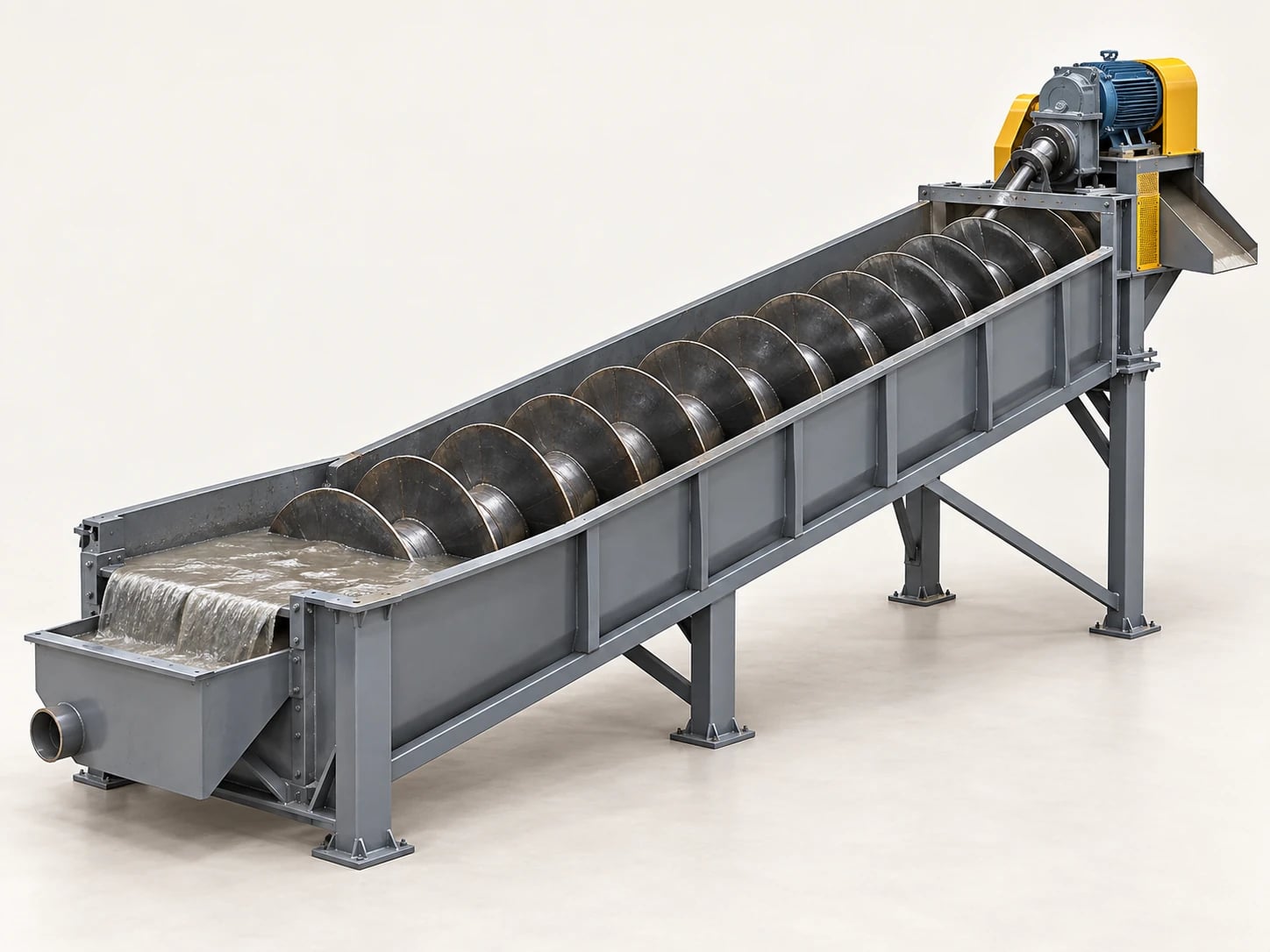 A spiral classifier: fine material overflows at the low end while the rotating spiral rakes settled sand up the inclined trough and back to the mill.